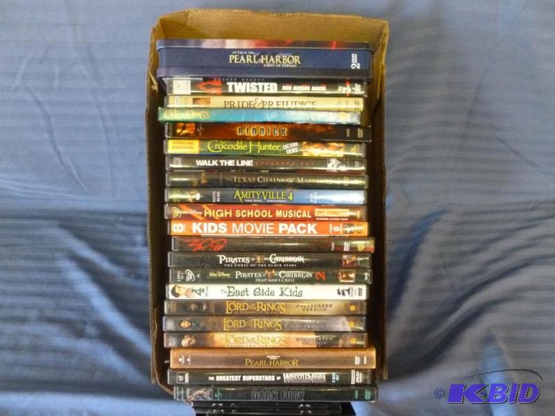 lot 139 image: Large lot of 25 DVD Movies that includes a Pe...