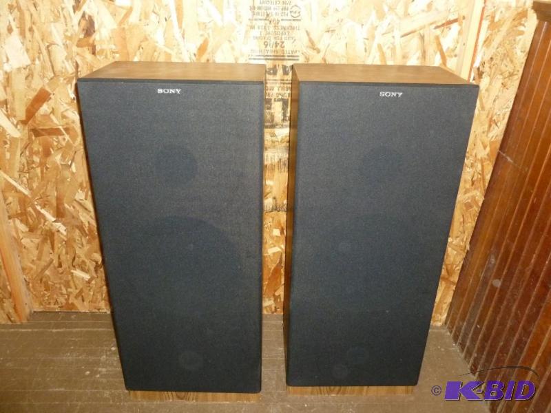 lot 140 image: A pair of Sony wood encased tower speakers mo...