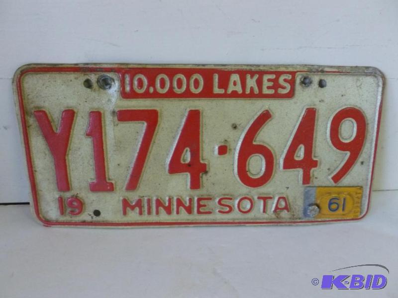 lot 153 image: Vintage 1961 Minnesota embossed metal license...