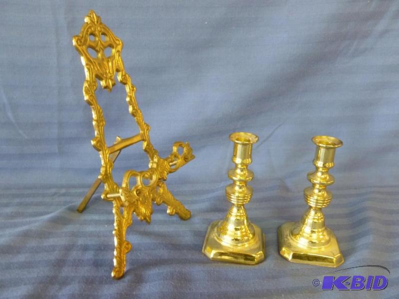 lot 46 image: A pair of Baldwin brass candlestick holders a...