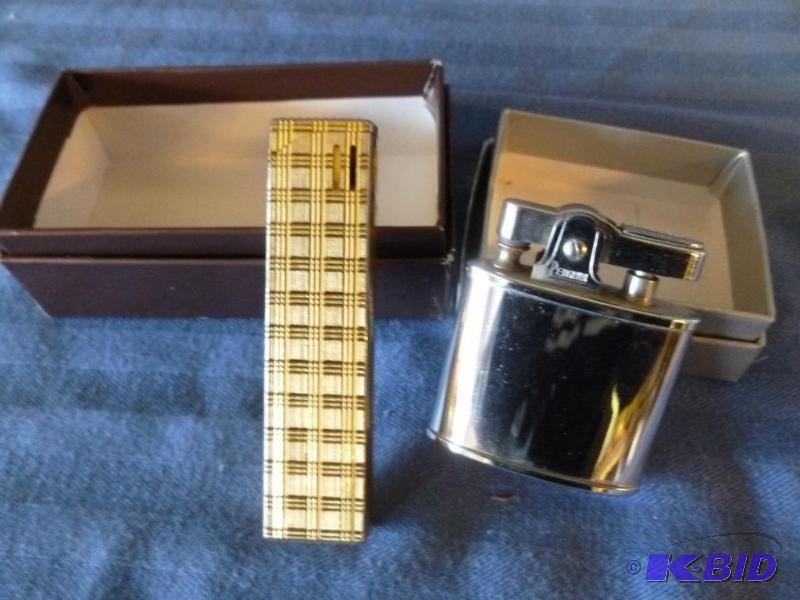 lot 74 image: Lot of two collectible cigarette lighters tha...