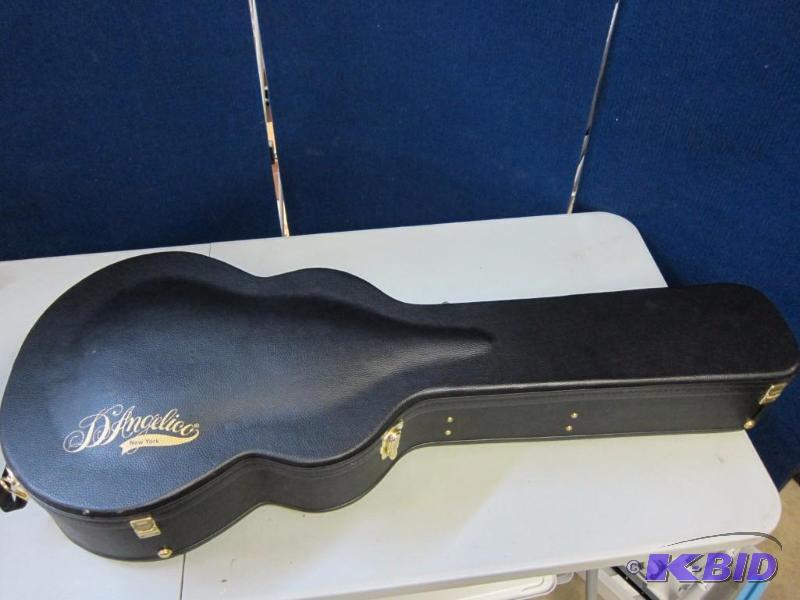 Guitar Case and Sheet Music Stand
