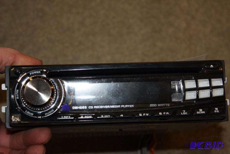 lot 15 image: Dual Electronics Corp. CD Player Deck Model XDM6820 Includes Cords.
