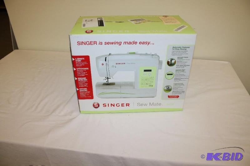lot 21 image: Singer Sew Mate 5400 Sewing Machine In Box.