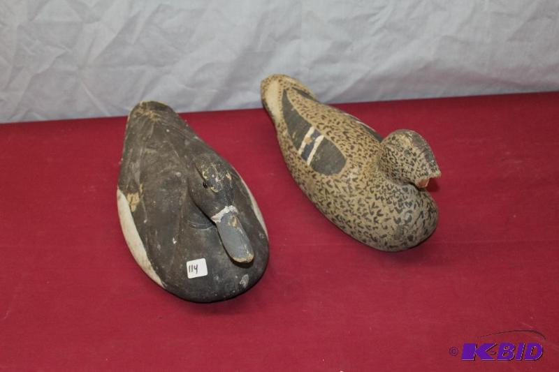 Duck Decoys  One is hand carved wood with a b...