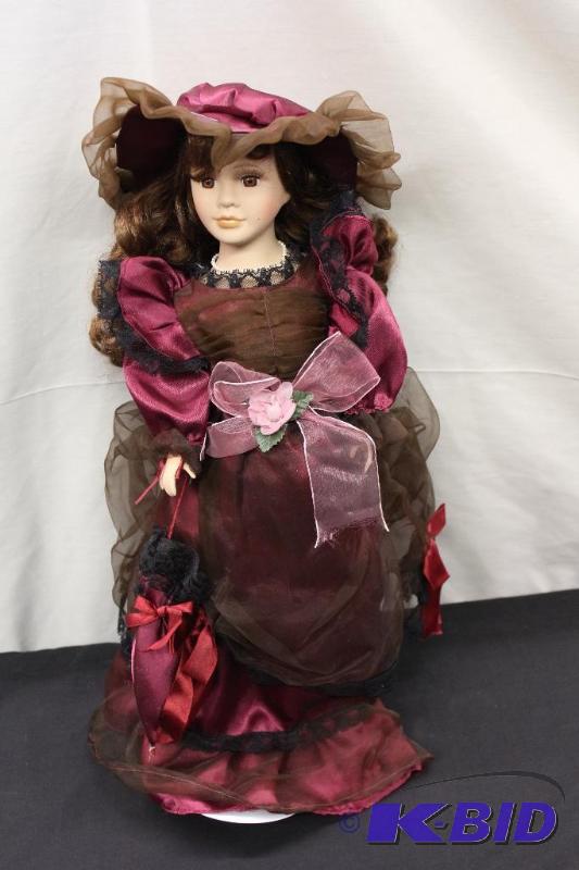 Porcelain Doll  Brown Hair Doll with Red Dres...