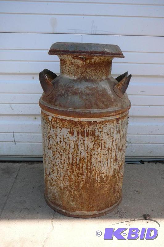 lot 24 image: Vintage Cream can and lid...