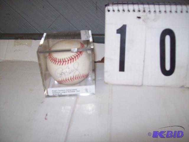 Roger Clemens Autographed Baseball. On an off...