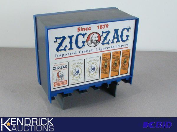 lot 18 image: Vintage Zig-Zag Cigarette Paper Dispenser