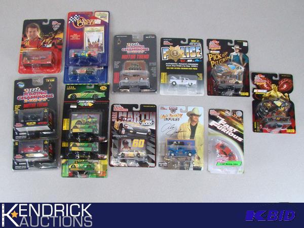 lot 48 image: 15 Vintage MINT ON CARD Racing Champion, Winners Circle, and John Deere Cars