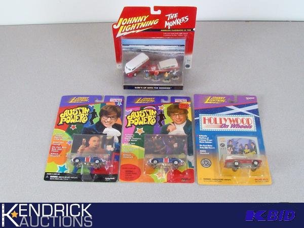 lot 63 image: 5 Vintage MINT ON CARD Johnny Lightning Monkeys, and Austin Powers Cars