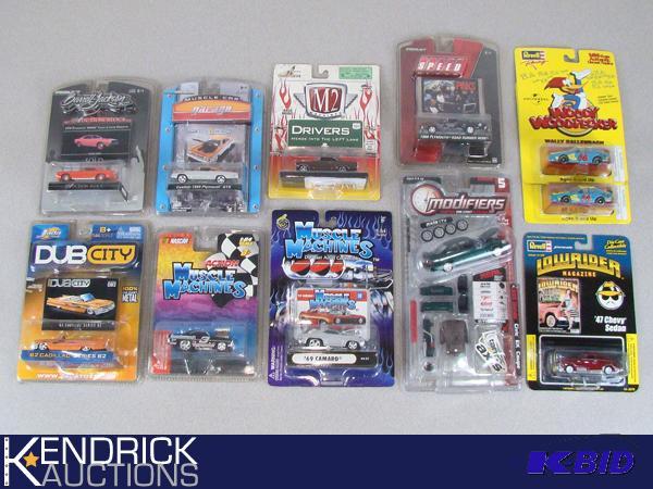 lot 67 image: 11 Vintage MINT ON CARD Misc. Brand Cars