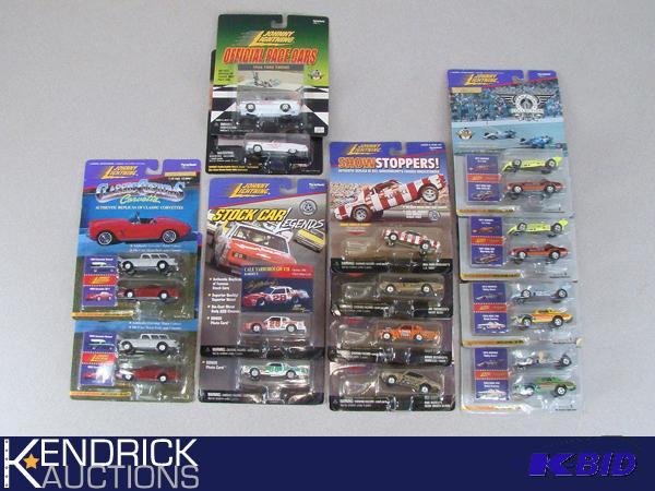 lot 7 image: 20 Vintage MINT ON CARD Johnny Lightning Race Type Cars