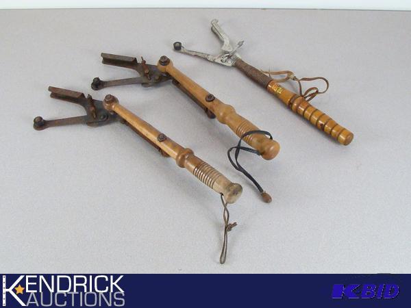 lot 70 image: Lot of 3 Vintage Wood Handled Trap Throwers
