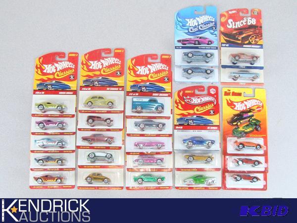 lot 9 image: 25 Vintage MINT ON CARD Hot Wheels Classics, The Hot Ones, Cool Classics, and Since 68 Cars