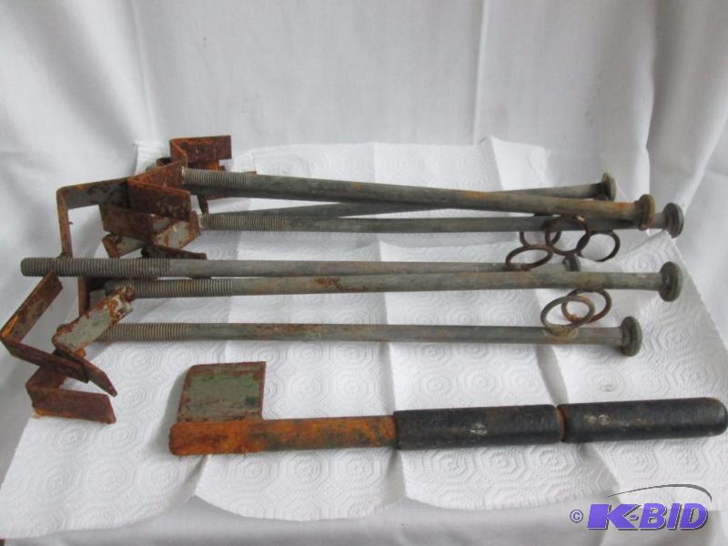 lot 21 image: Seven Snare Anchors and a Hatchet