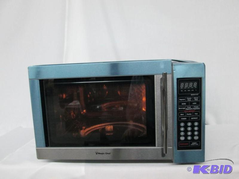 lot 23 image: Magic Chef 1.3 cu. ft. 1100 Watt Microwave