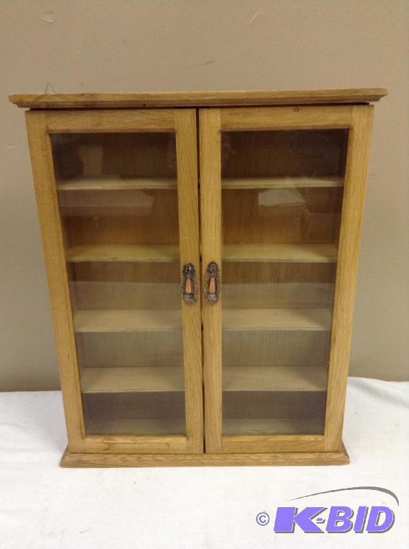 lot 31 image: Glass Door Cabinet