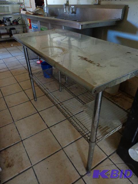 lot 115 image: Stainless Steel table   49 x 24 x 35  grated ...