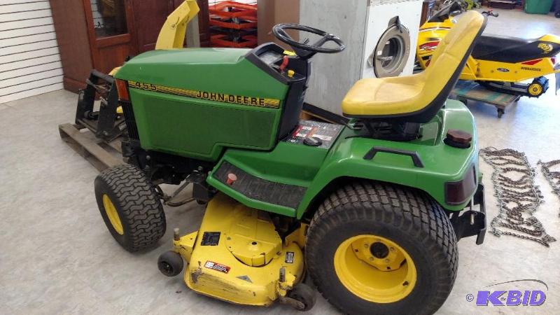 John Deere Riding Lawn Mower with Snow Blower Attachment