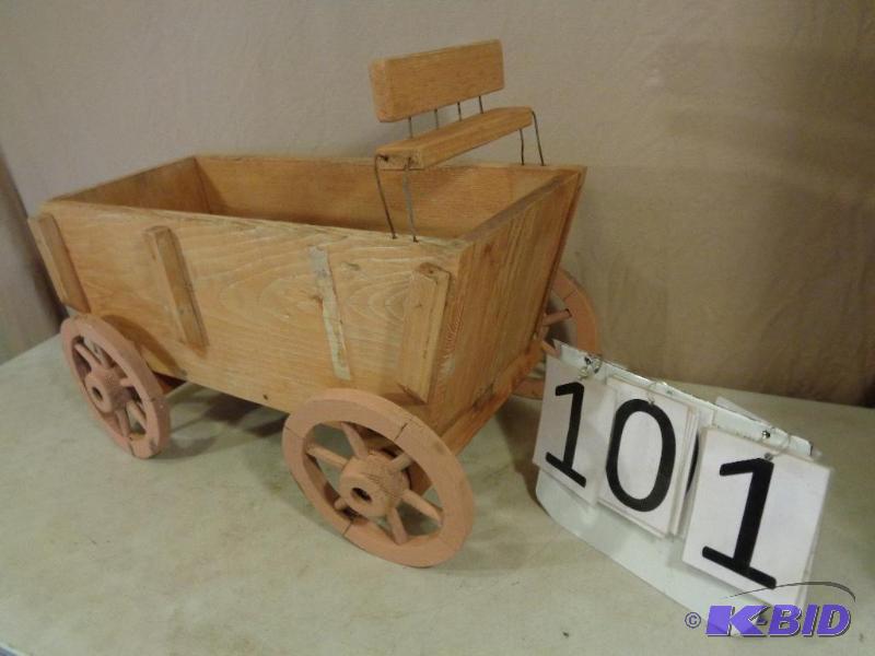 lot 101 image: Wood Lawn Wagon. Measures approximately 27&qu...
