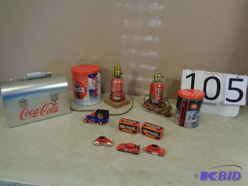 lot 105 image: Metal Coca Cola Lunchbox, 2 Coke Can Lamps, T...