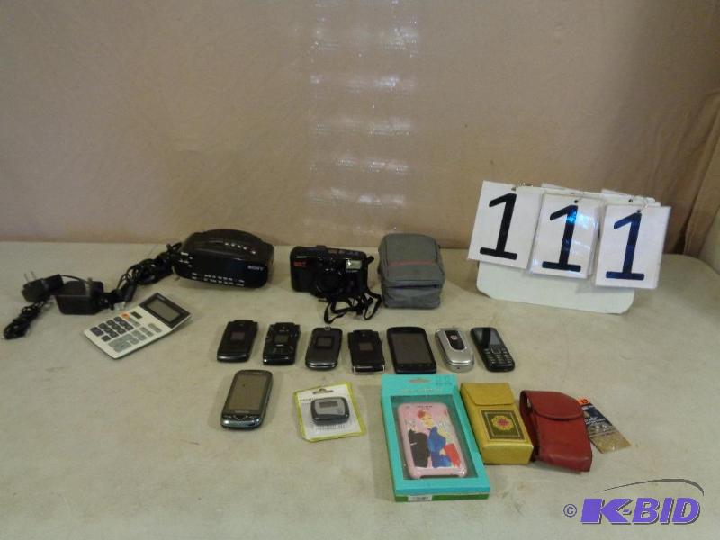 lot 111 image: Lot of Cellphones, Cases, and More. Coach Pho...