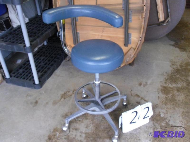 lot 22 image: Rolling stool. Back rest swivels and can doub...