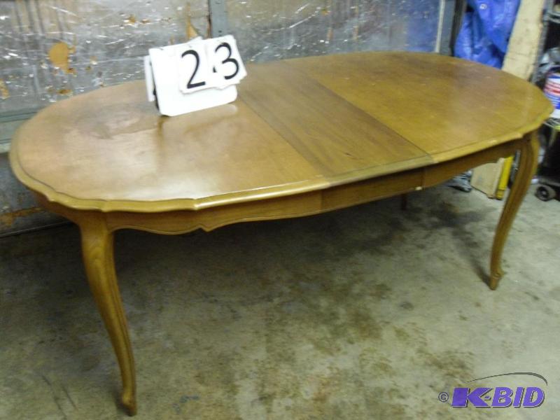 lot 23 image: Dining Table. Needs some TLC on the top and t...