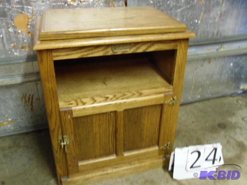lot 24 image: TV Stand  Media Stand. Top swivels. Marked &...