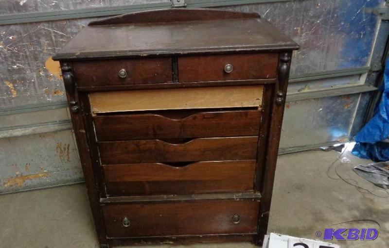 lot 25 image: 7 drawer dresser. Looks like it had doors at ...