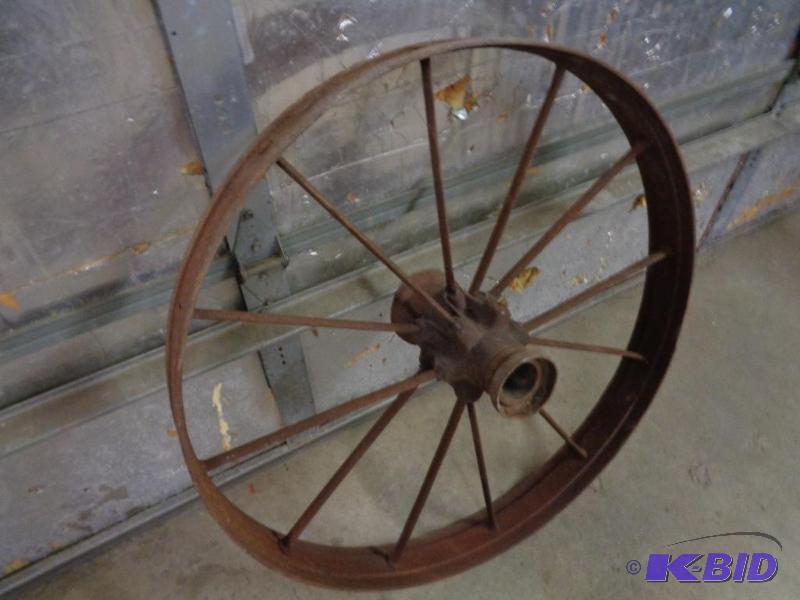 lot 2D image: Steel Wagon Wheel. Measures approximately 34&...
