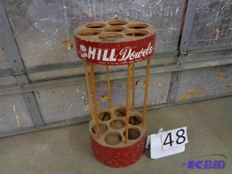 lot 48 image: Old display fixture for wood dowels. From Coo...