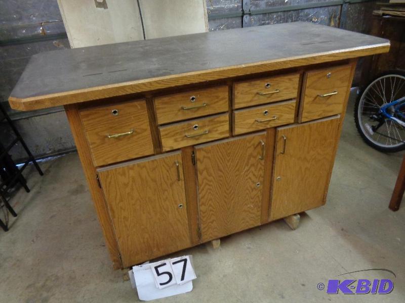 lot 57 image: Heavy Wood Cabinet  Ticket Counter. Has slot...