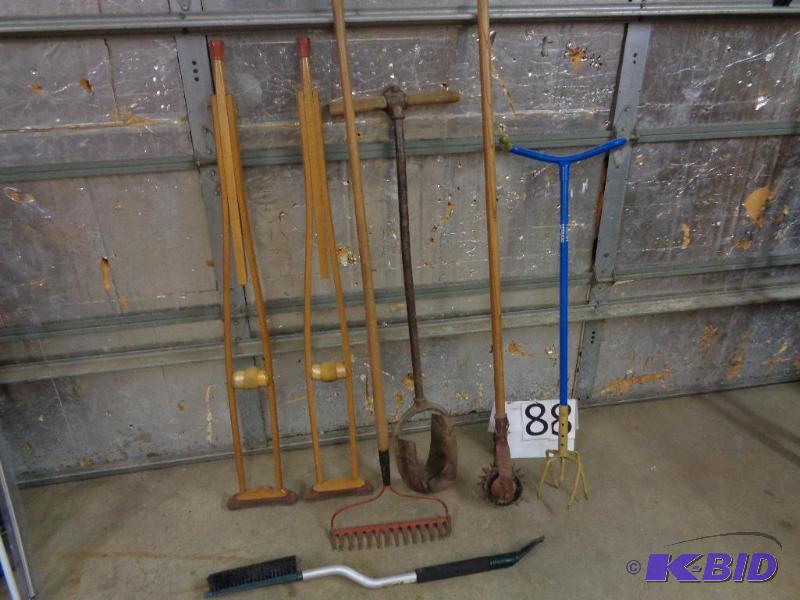 lot 88 image: Assorted long handle items. Crutches, garden ...