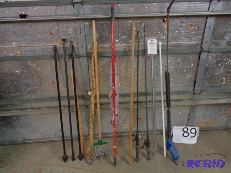 lot 89 image: Assorted long handle items. Fishing rods (one...