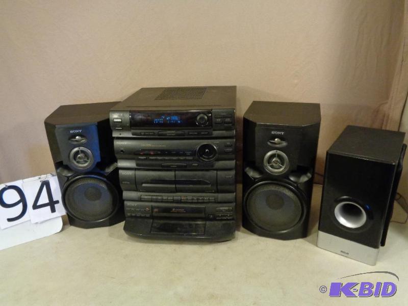 lot 94 image: Sony Stereo and Extra RCA Speaker. Holds 5 CD...