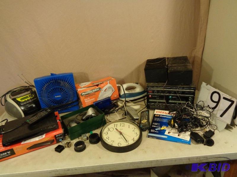 lot 97 image: DVD Player, Irons, Cordless Mouse, Alarm Cloc...