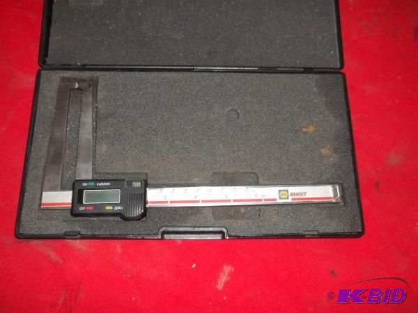 lot 21 image: Disc brake rotor measuring tool....