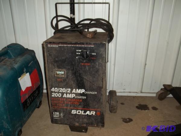 lot 9 image: Solar Battery charger with engine start....