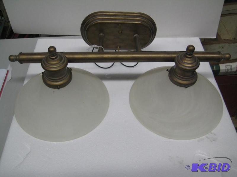 lot 10 image: New display model to bulb vanity wall sconce....