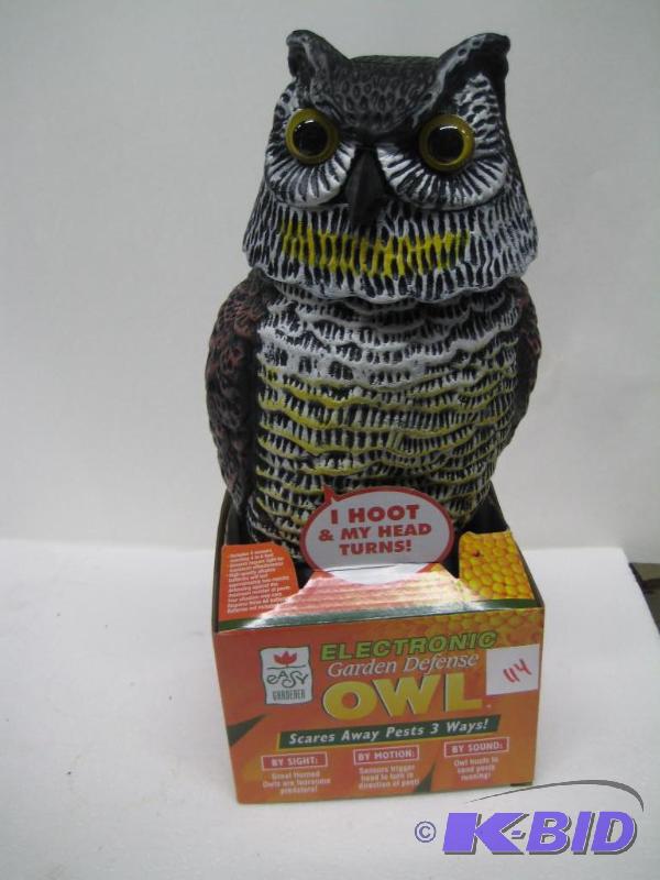 lot 114 image: New electronic garden owl. Scares away pests ...