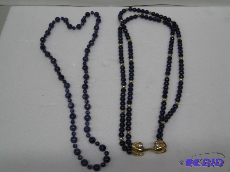 lot 82 image: New qty 2 womens necklaces. One is a blue bea...