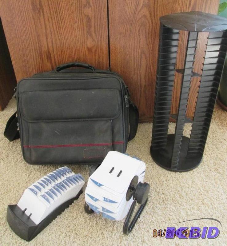 lot 110 image: Rolodex, Targus computer case, spinning CD ho...