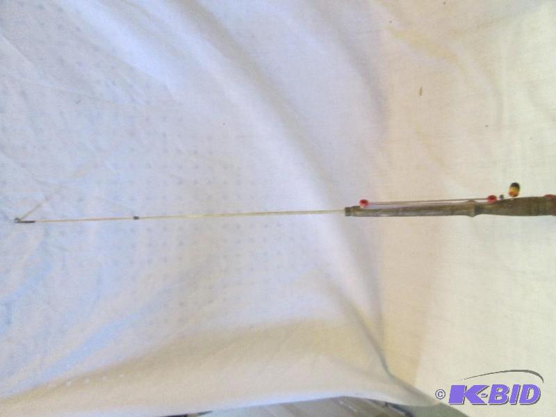 lot 189 image: vintage fishing pole- string is a little tang...