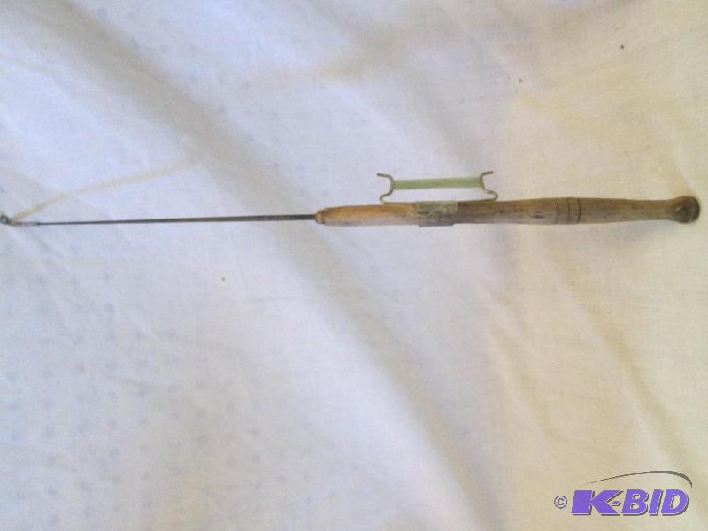 lot 191 image: vintage fishing pole with metal string holder...