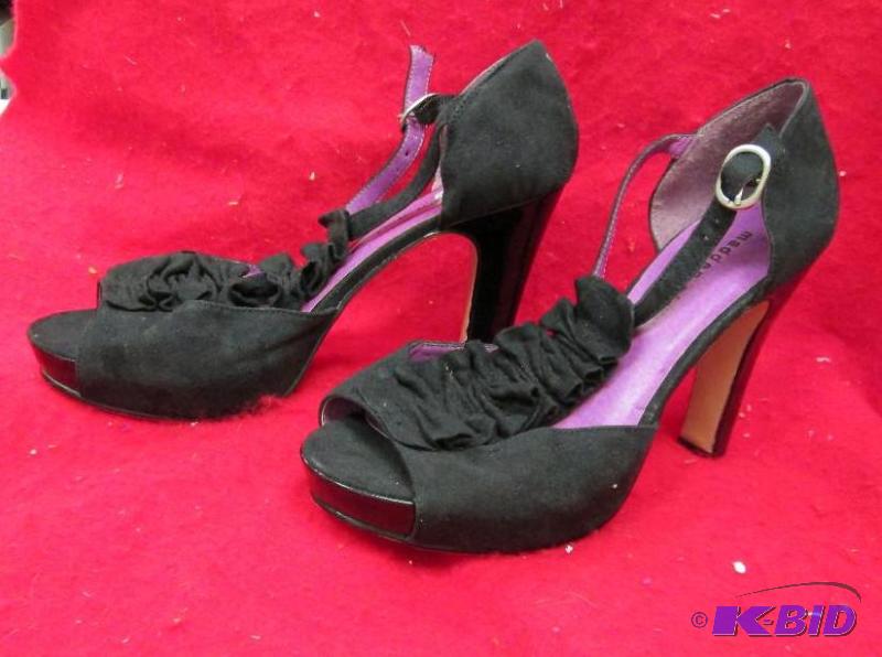 lot 54 image: Madden girl size 9 black heels...
