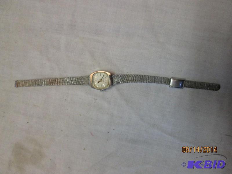 lot 77 image: Benrus watch...