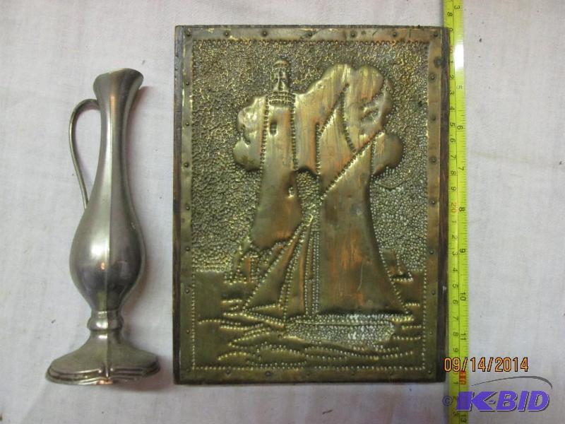 lot 79 image: Light house metal wall dcor with a heavy for ...