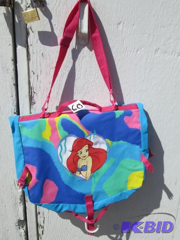 lot 82 image: Little Mermaid bag  closet organizer...